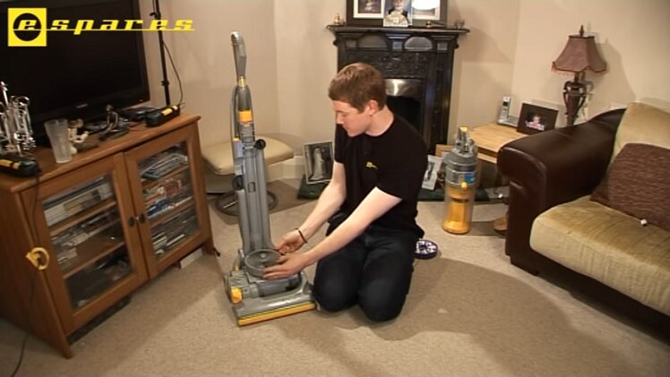 The post-motor filter, which is stored at the base of the vacuum cleaner above the floor tool and beneath the canister