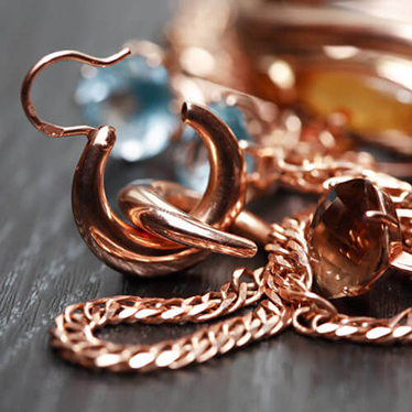 Gold earrings on a table