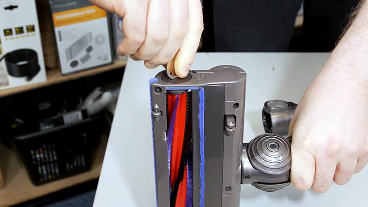 Use a coin or a flathead screwdriver to unscrew the motorhead's cap