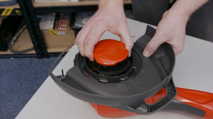 How to Replace the Manual Line Feeder on a Flymo Grass Trimmer