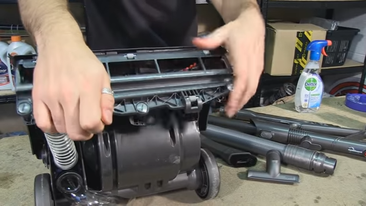 Remove the cover from your brushroll by undoing the screws that hold it in place