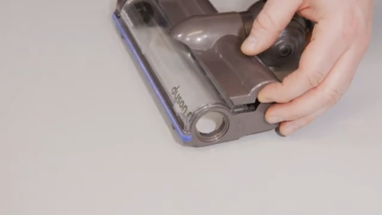 To separate the upper housing from the lower housing, use your fingers to gently prize them apart from the left and right hand side